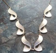 Ivar Holth white enamel swirl leaves necklace